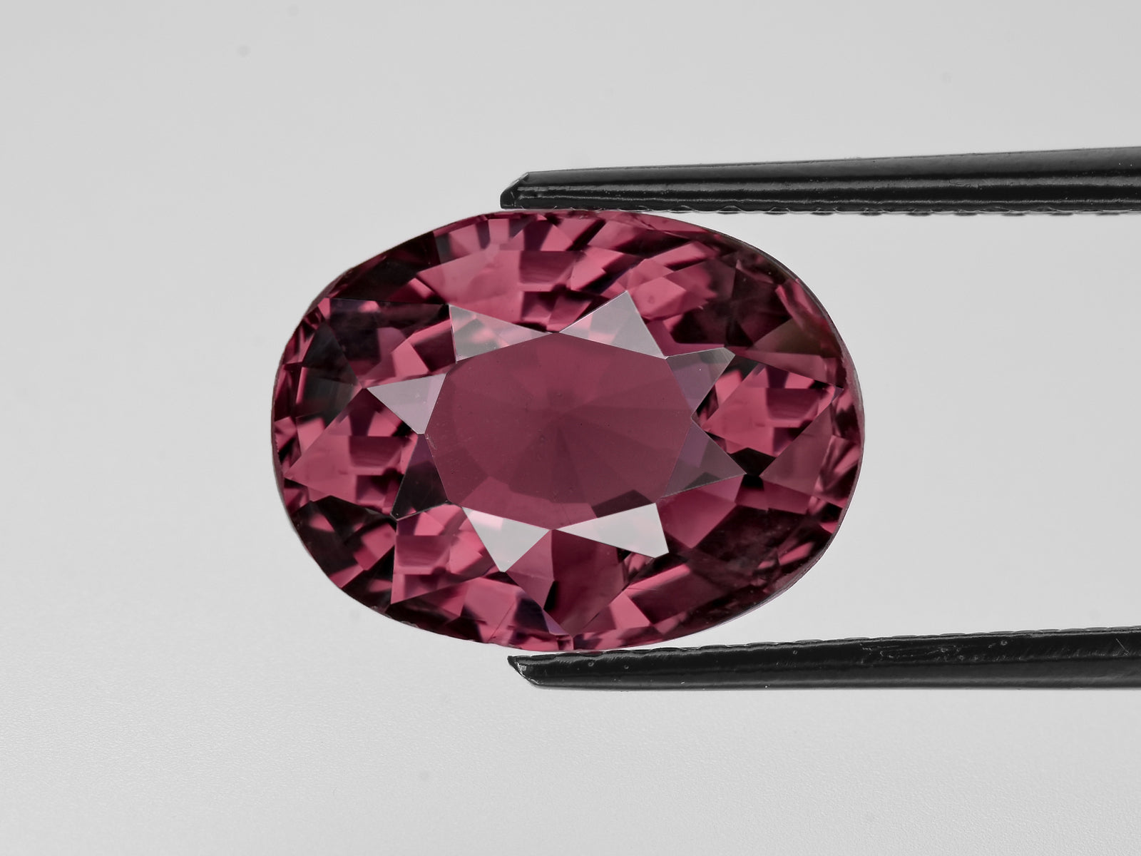 8802257-oval-deep-intense-pinkish-purple-gia-grs-madagascar-natural-other-fancy-sapphire-7.06-ct