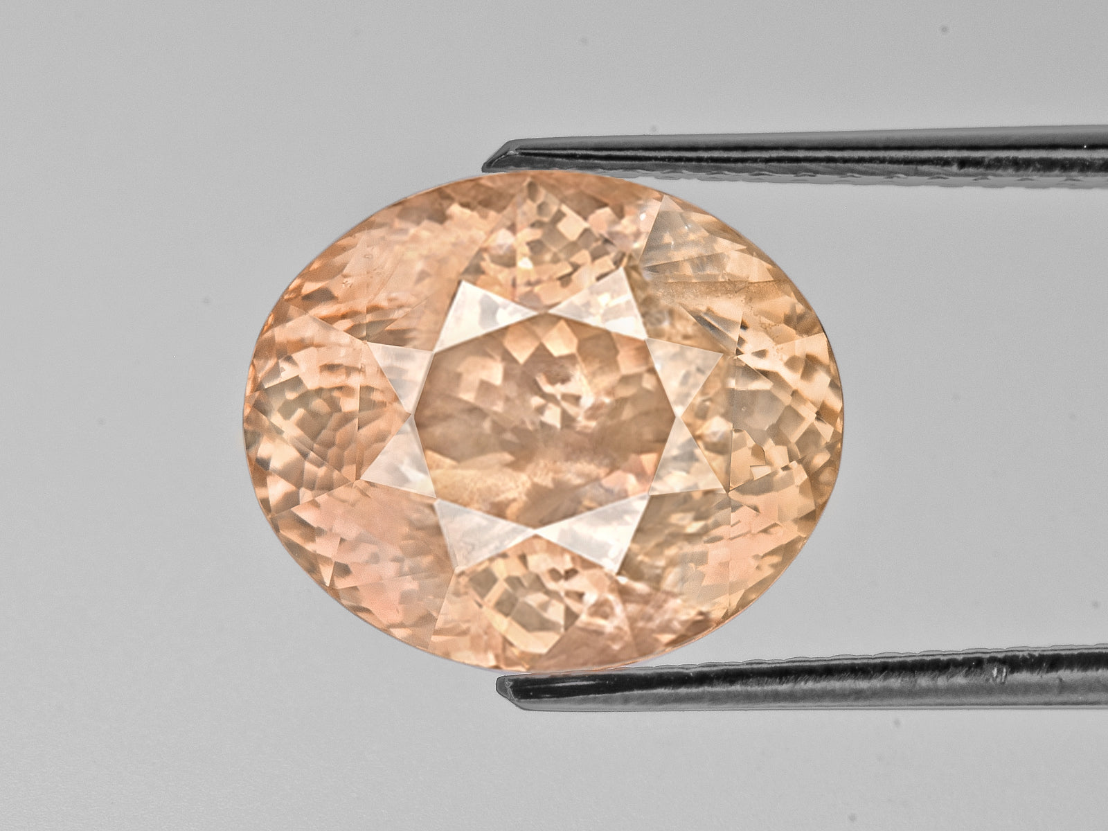 8802235-oval-lustrous-sunset-orange-with-slight-pinkish-hue-grs-sri-lanka-natural-padparadscha-14.48-ct