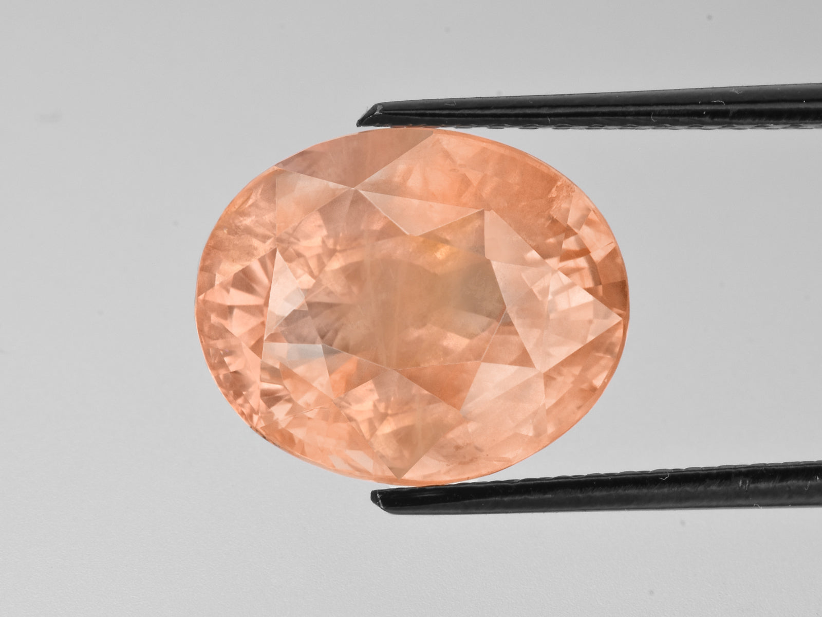 8802236-oval-sunset-orange-with-pinkish-hue-grs-sri-lanka-natural-padparadscha-13.05-ct