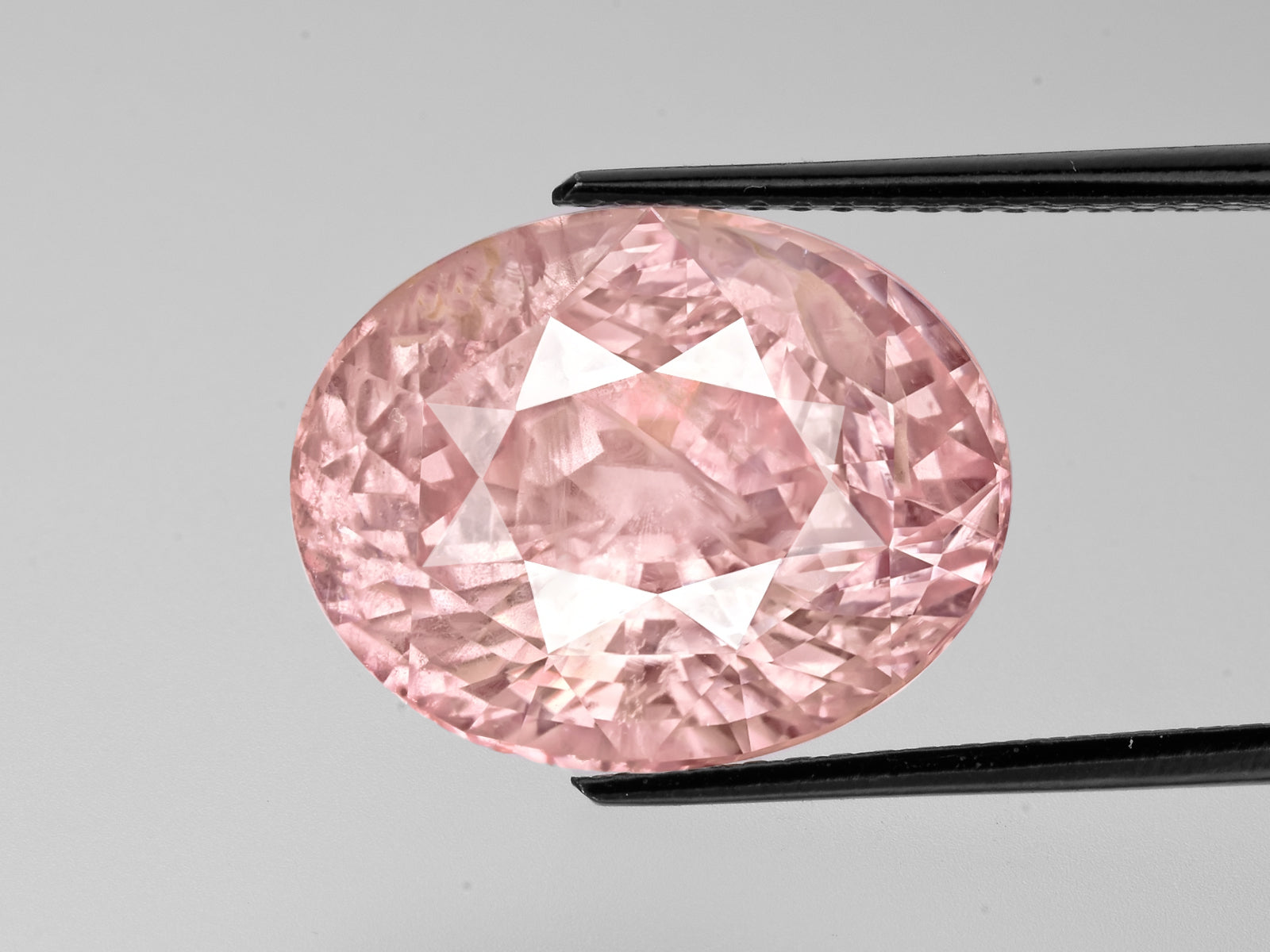 8802237-oval-lustrous-orangy-pink-grs-sri-lanka-natural-padparadscha-20.75-ct