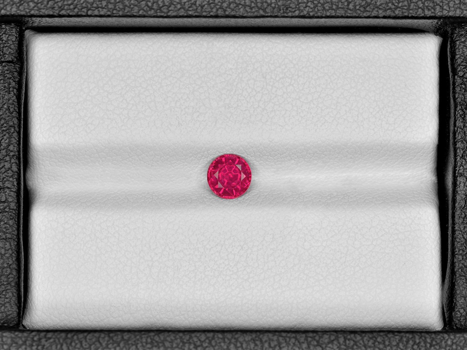 8802739-round-bright-pinkish-red-igi-tanzania-natural-ruby-0.73-ct