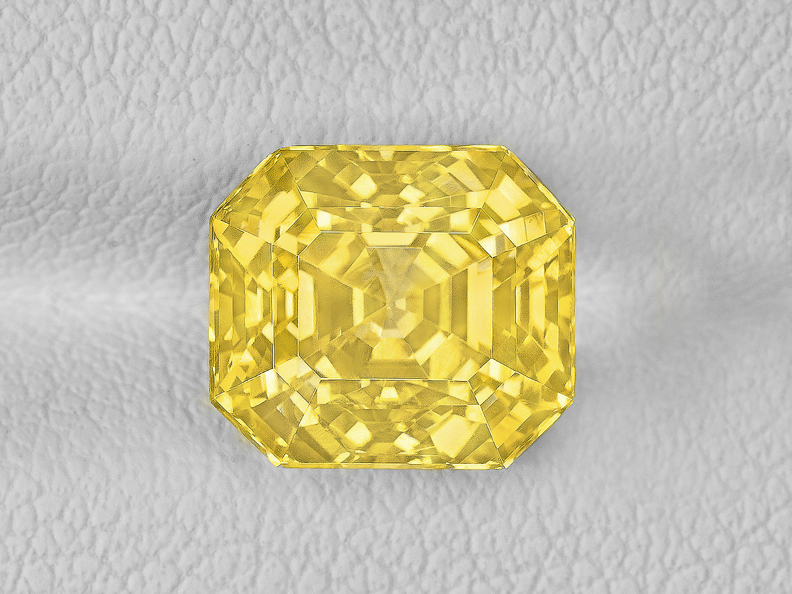 8802592-octagonal-lustrous-intense-yellow-igi-sri-lanka-natural-yellow-sapphire-5.52-ct