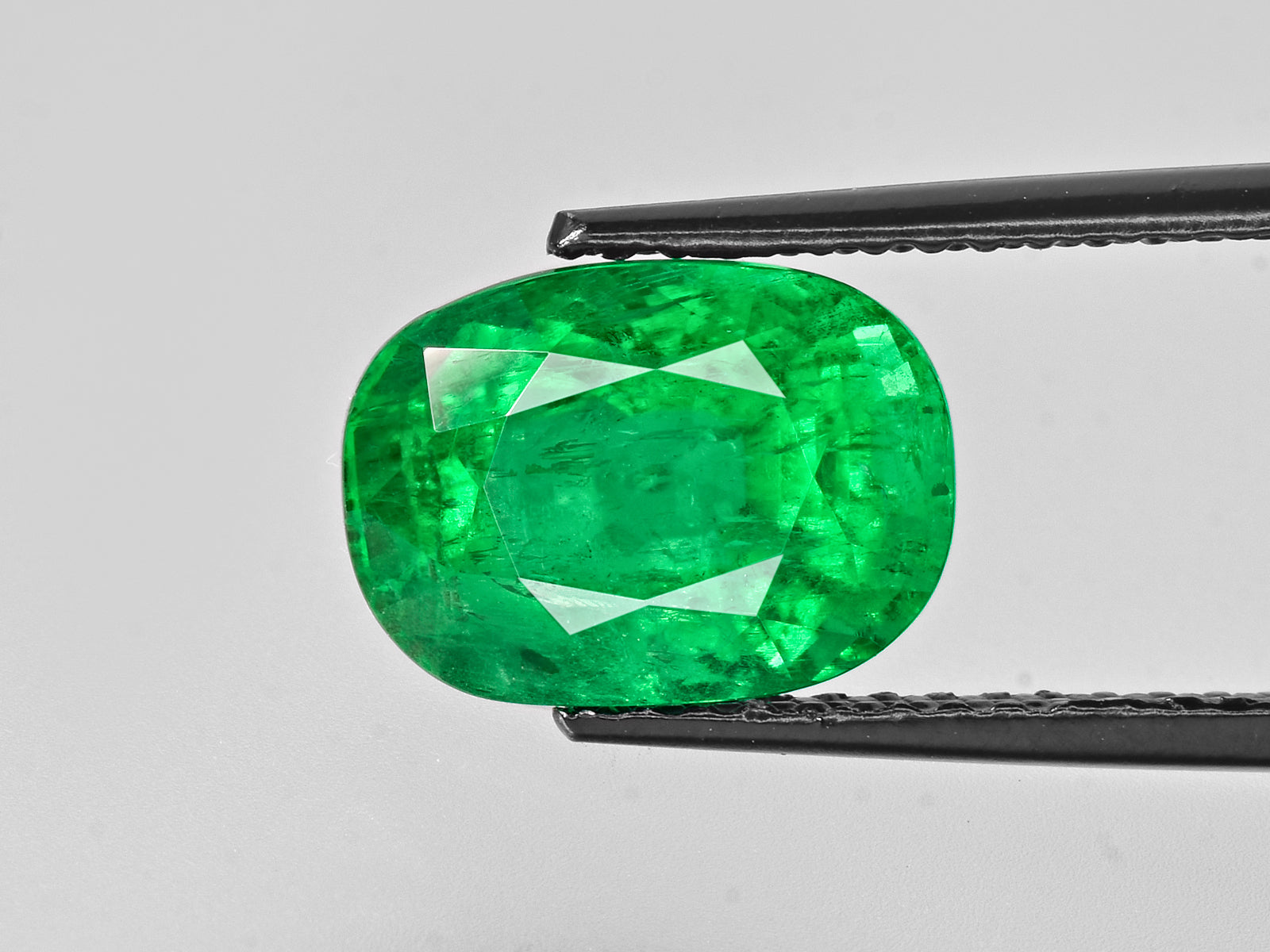 8802603-cushion-bright-neon-green-gia-afghanistan-natural-emerald-5.21-ct