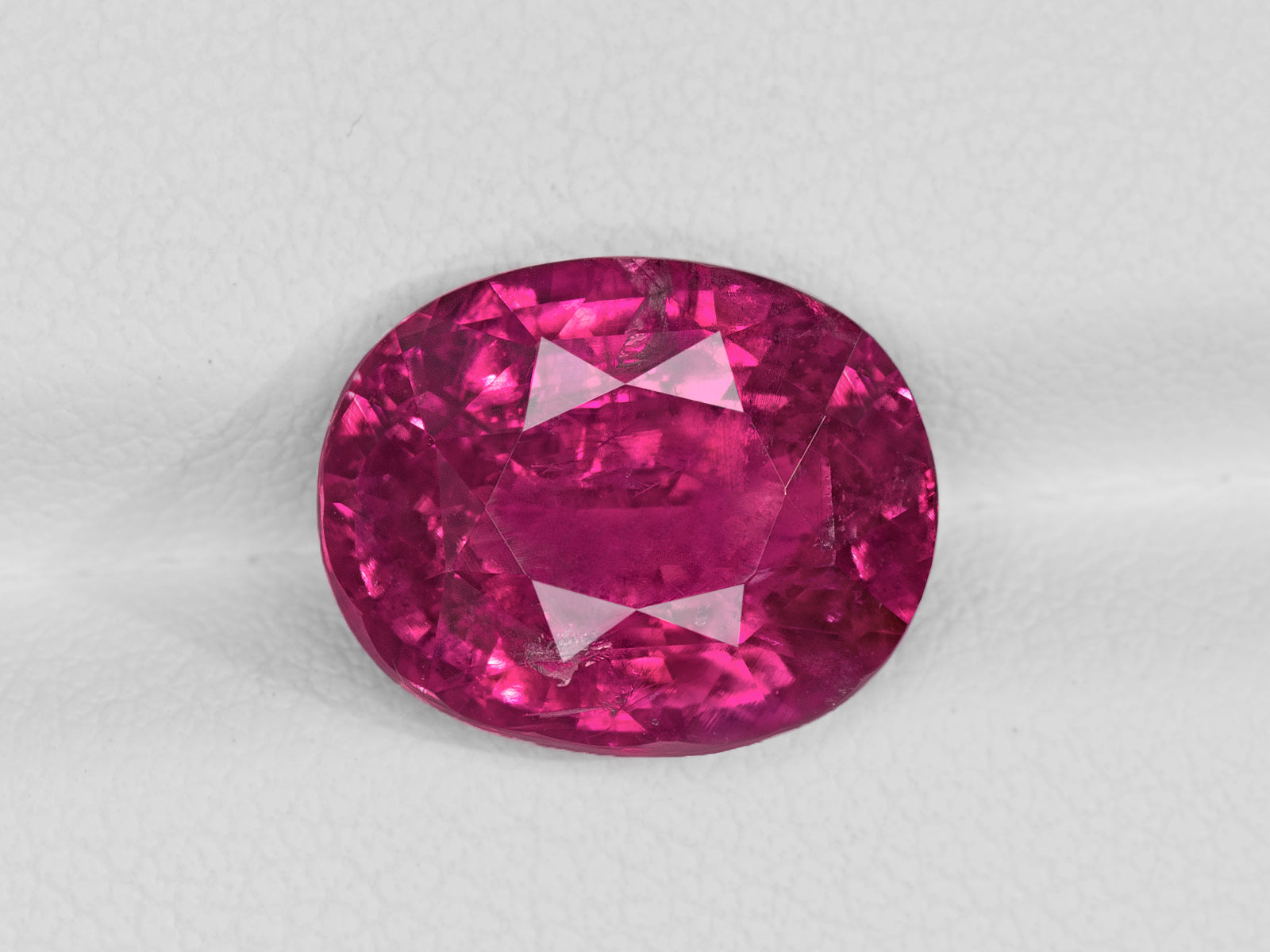 8802744-oval-fiery-vivid-purple-red-gia-afghanistan-natural-ruby-8.12-ct