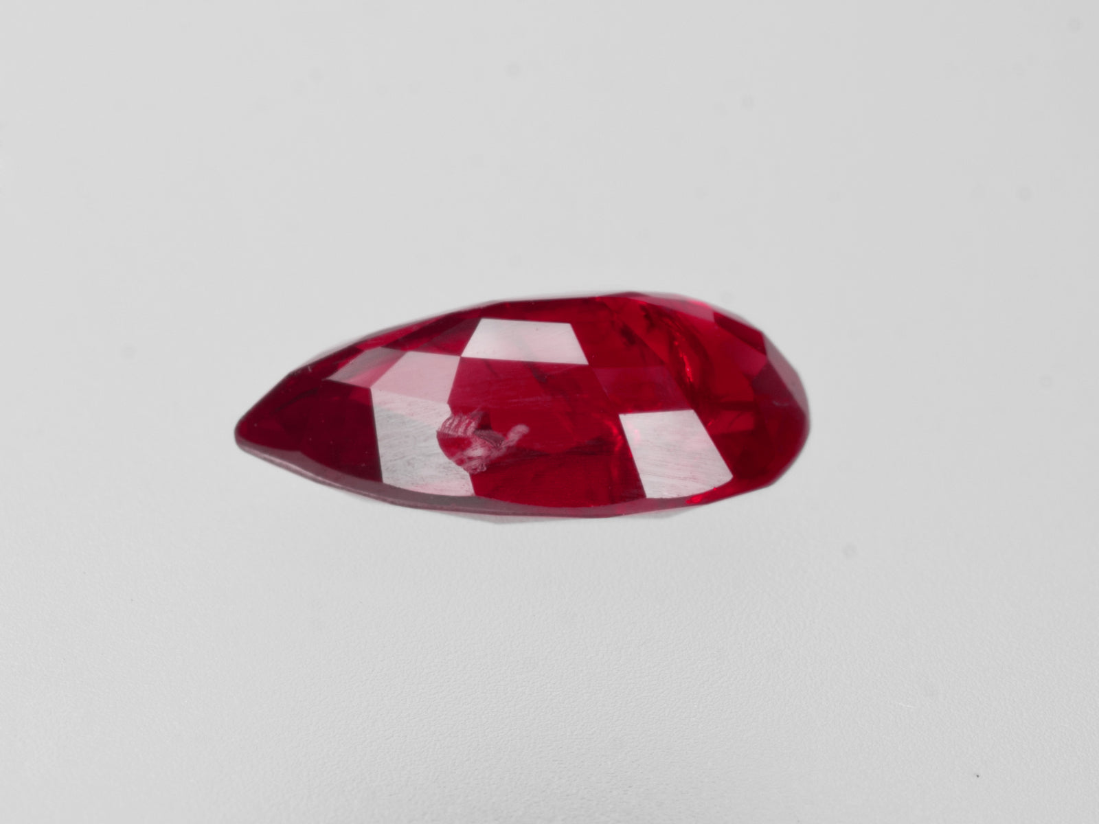 8802838-pear-fiery-vivid-pigeon-blood-red-aigs-mozambique-natural-ruby-2.03-ct