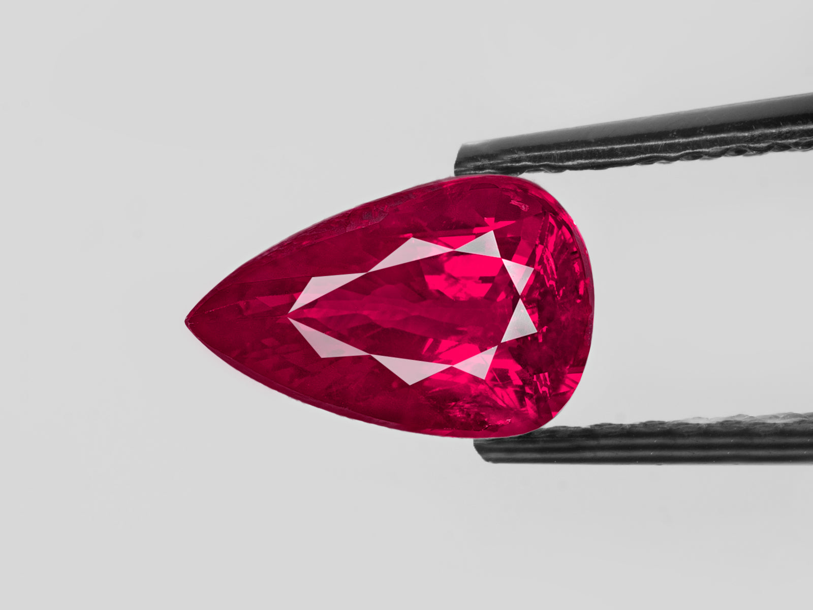 8802840-pear-fiery-neon-pinkish-red-grs-mozambique-natural-ruby-2.01-ct