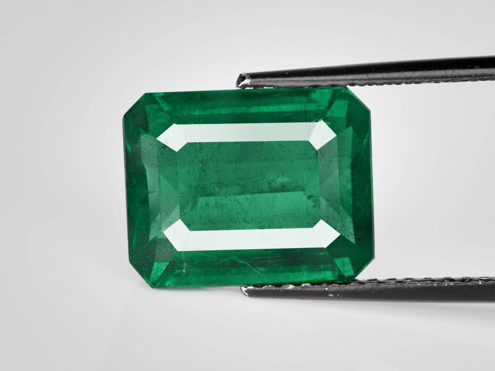 8802924-octagonal-deep-green-igi-zambia-natural-emerald-9.49-ct