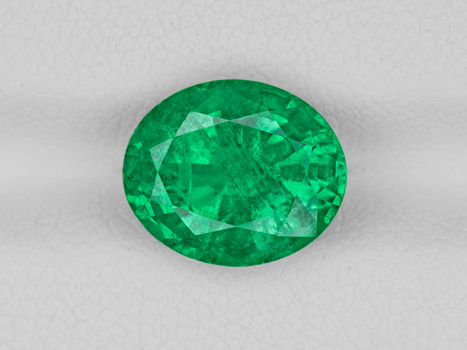 8802918-oval-fiery-vivid-intense-green-igi-zambia-natural-emerald-3.39-ct