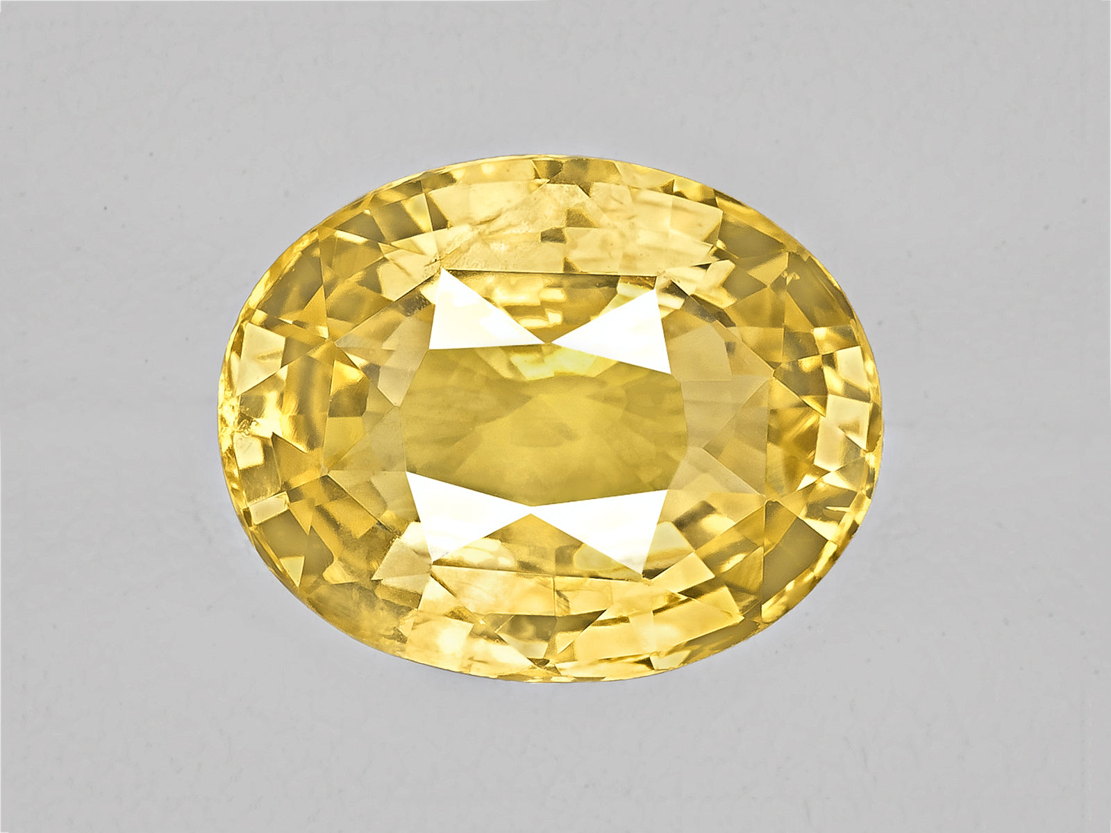 8802934-oval-intense-yellow-sri-lanka-natural-yellow-sapphire-6.29-ct