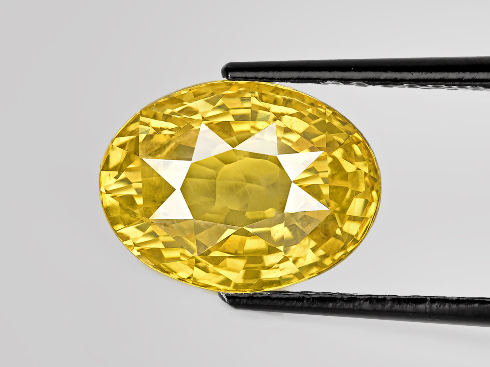 8802936-oval-fiery-intense-yellow-sri-lanka-natural-yellow-sapphire-6.84-ct