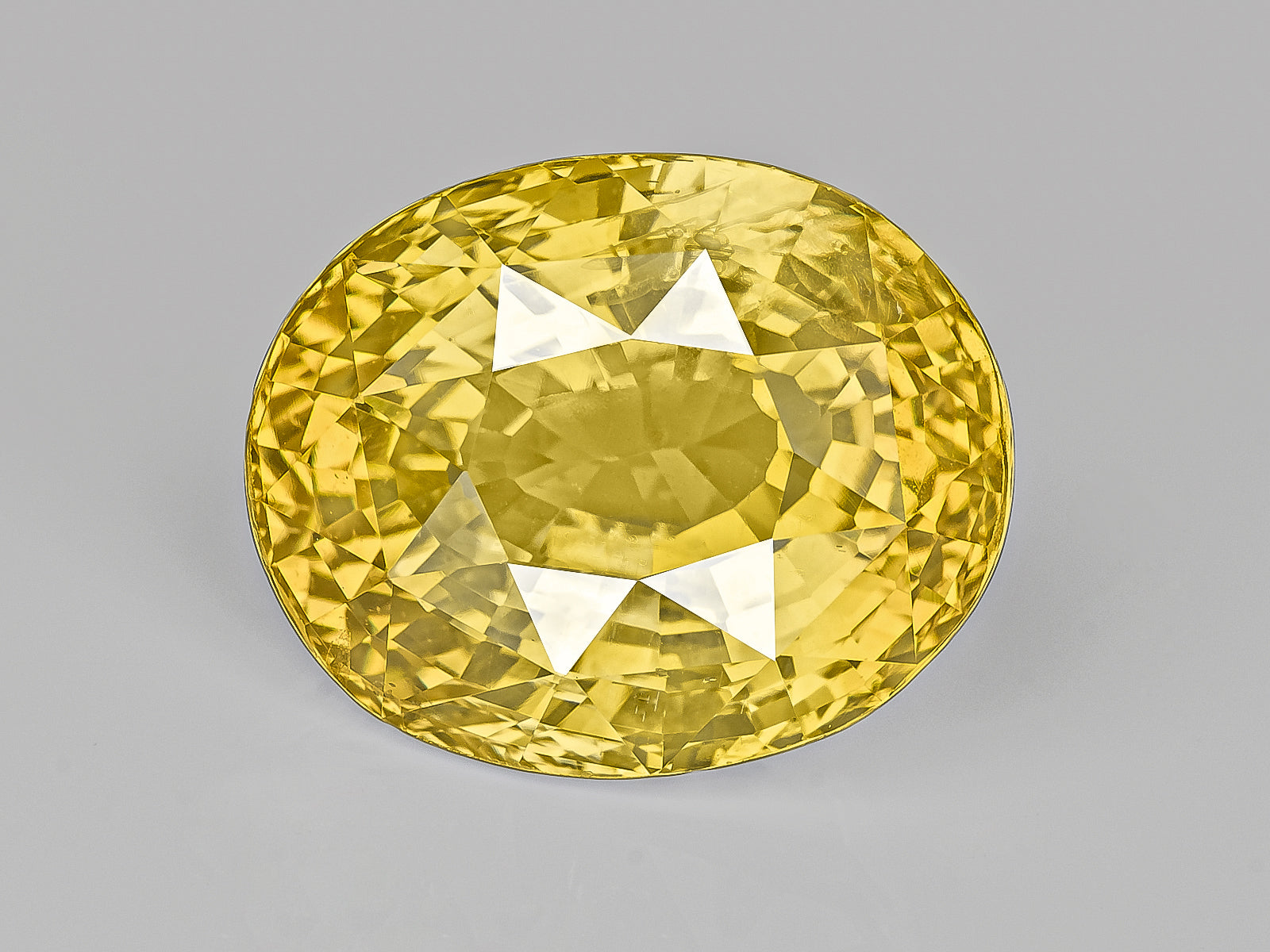 8802944-oval-fiery-intense-yellow-sri-lanka-natural-yellow-sapphire-11.12-ct