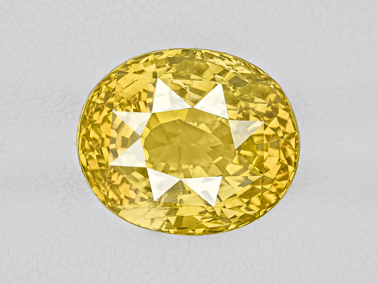 8802944-oval-fiery-intense-yellow-sri-lanka-natural-yellow-sapphire-11.12-ct