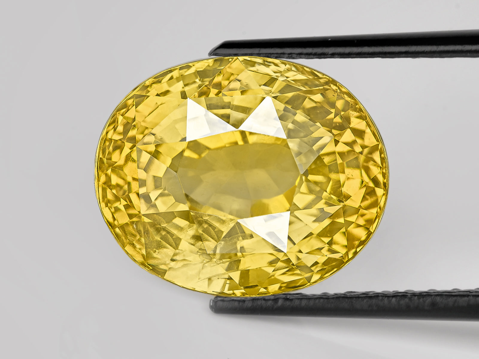 8802944-oval-fiery-intense-yellow-sri-lanka-natural-yellow-sapphire-11.12-ct