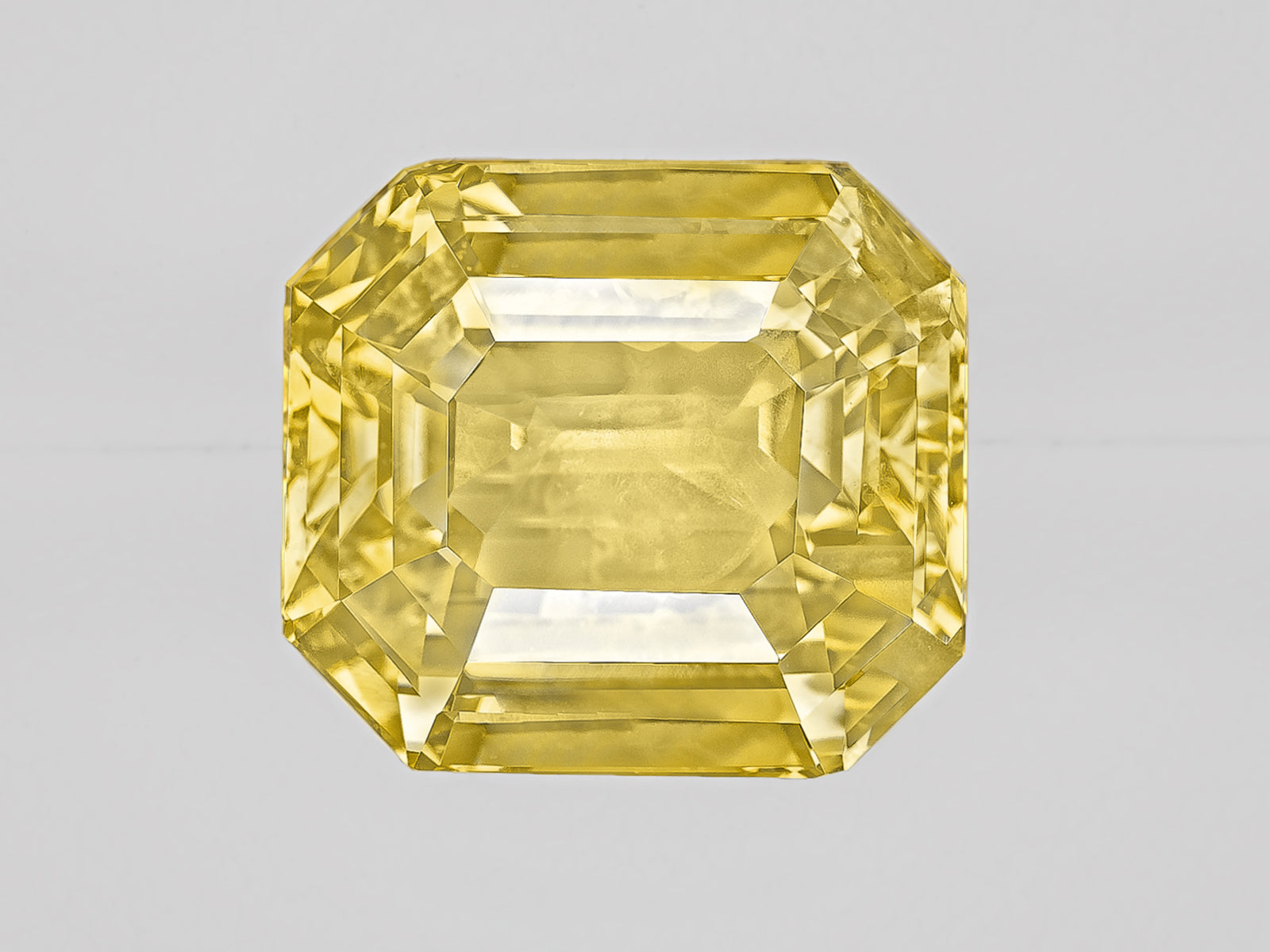 8802948-octagonal-lustrous-intense-yellow-sri-lanka-natural-yellow-sapphire-12.16-ct