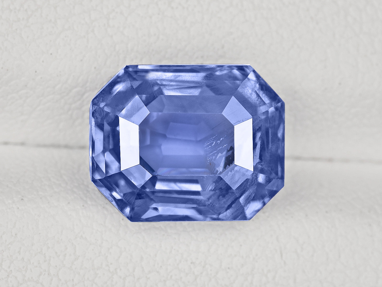 8802953-octagonal-lustrous-violetish-blue-sri-lanka-natural-blue-sapphire-6.87-ct