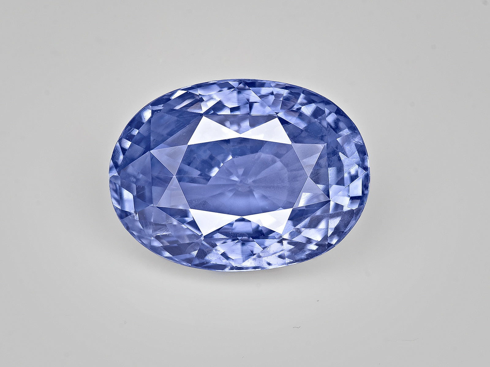 8802954-oval-lustrous-violetish-blue-sri-lanka-natural-blue-sapphire-8.04-ct