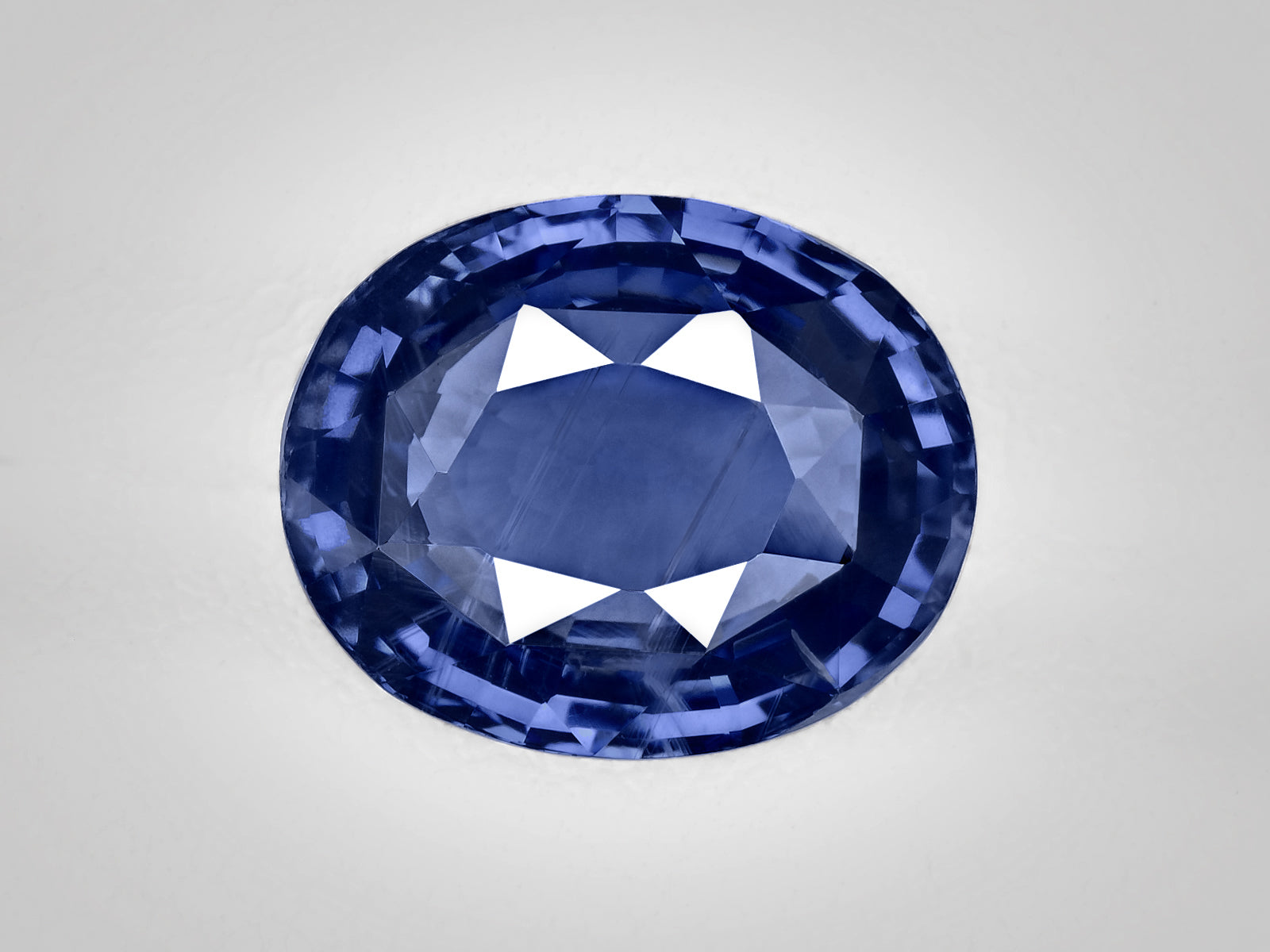 8802956-oval-deep-violetish-blue-sri-lanka-natural-blue-sapphire-5.49-ct