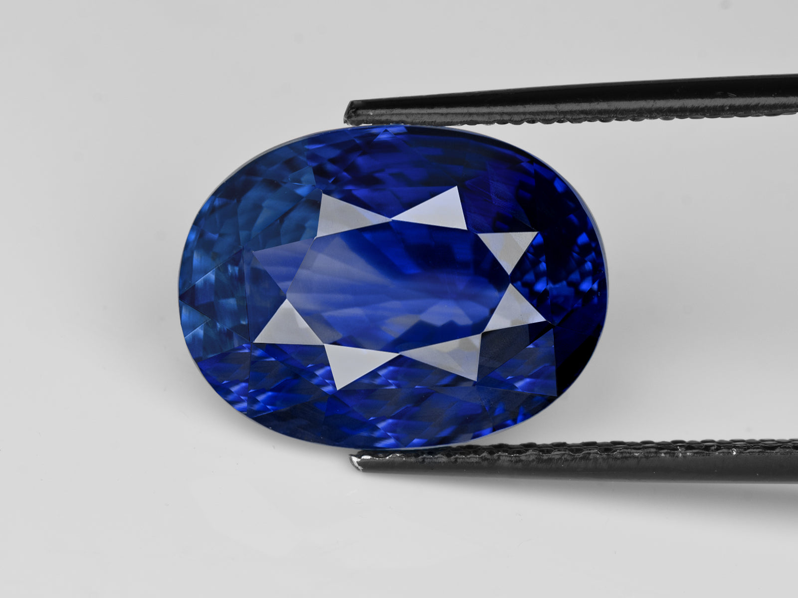 8802969-oval-intense-royal-blue-ink-blue-grs-sri-lanka-natural-blue-sapphire-15.69-ct