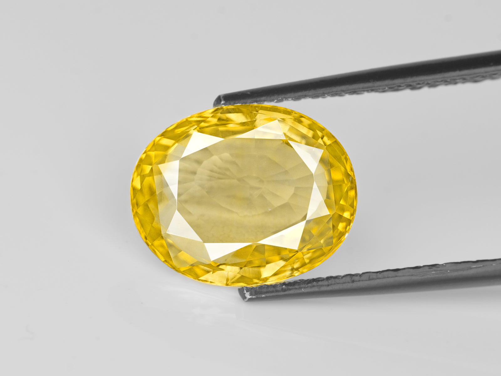 8802964-oval-deep-yellow-gia-sri-lanka-natural-yellow-sapphire-6.40-ct