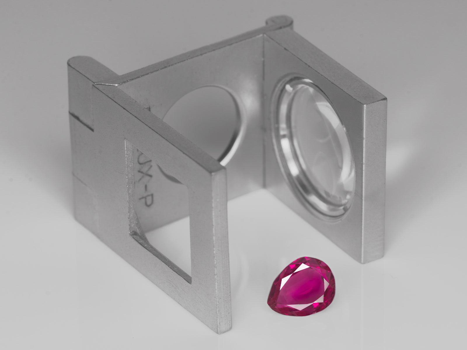 8803046-pear-rich-intense-purplish-red-gia-burma-natural-ruby-1.48-ct