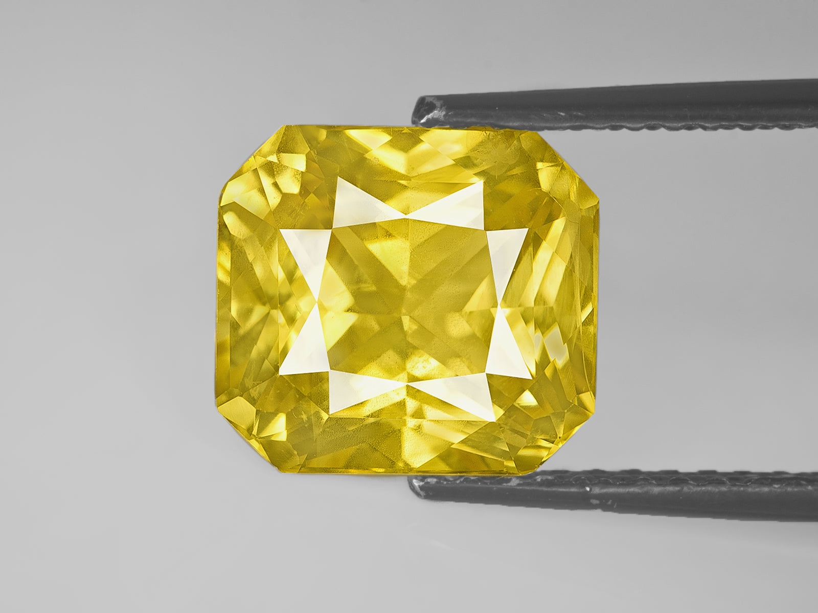 8803027-octagonal-fiery-intense-yellow-gia-sri-lanka-natural-yellow-sapphire-6.99-ct