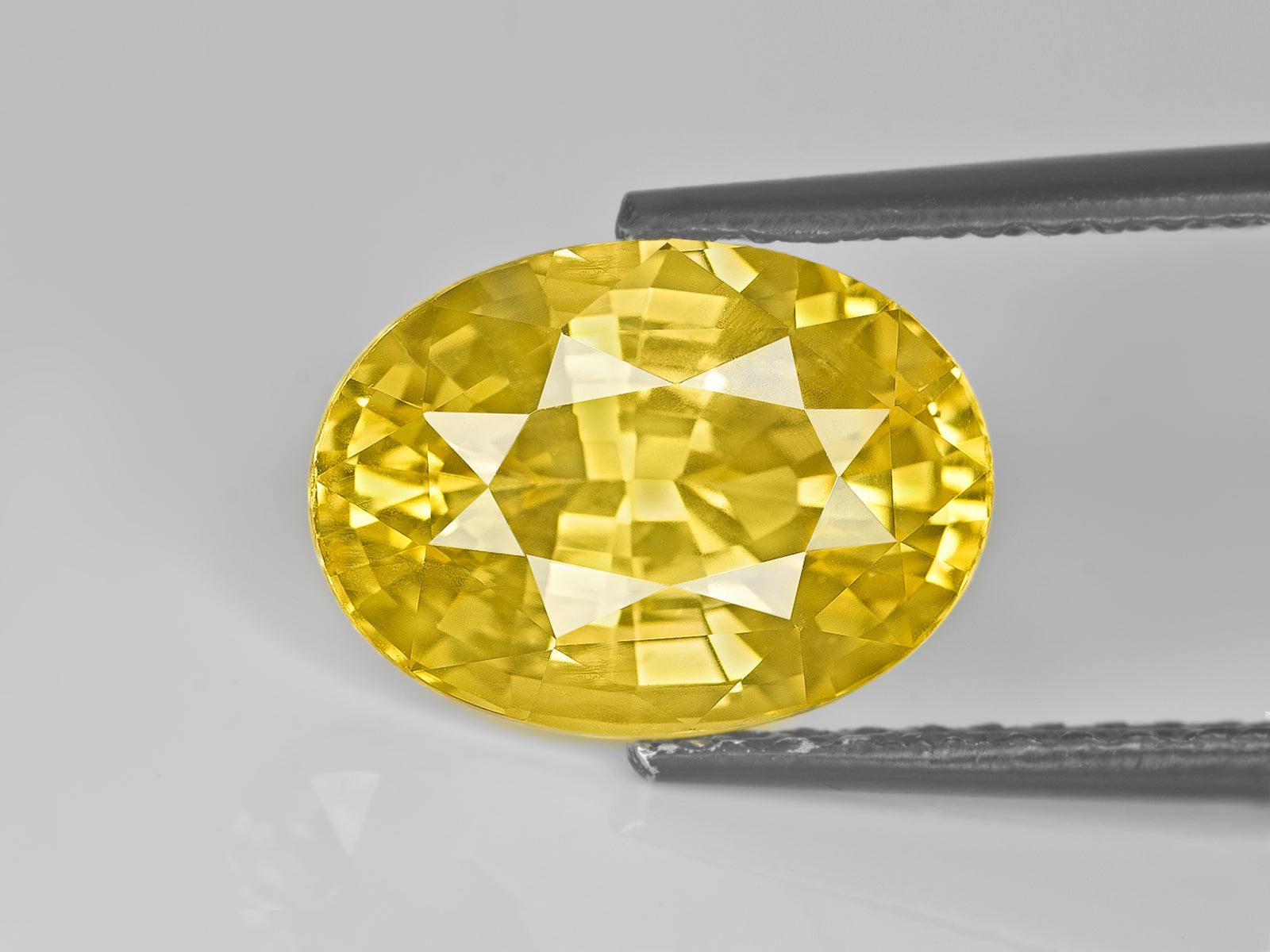 8803032-oval-lustrous-intense-yellow-gia-sri-lanka-natural-yellow-sapphire-5.24-ct