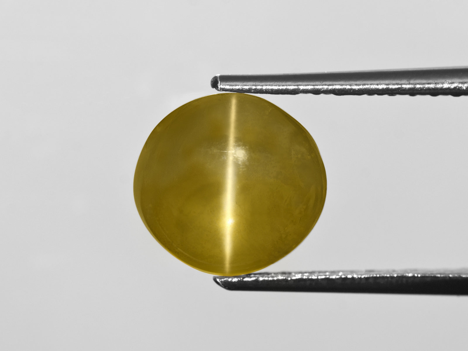 8803033-cabochon-orangy-greenish-yellow-honey-gia-sri-lanka-natural-chrysoberyl-cat's-eye-6.65-ct