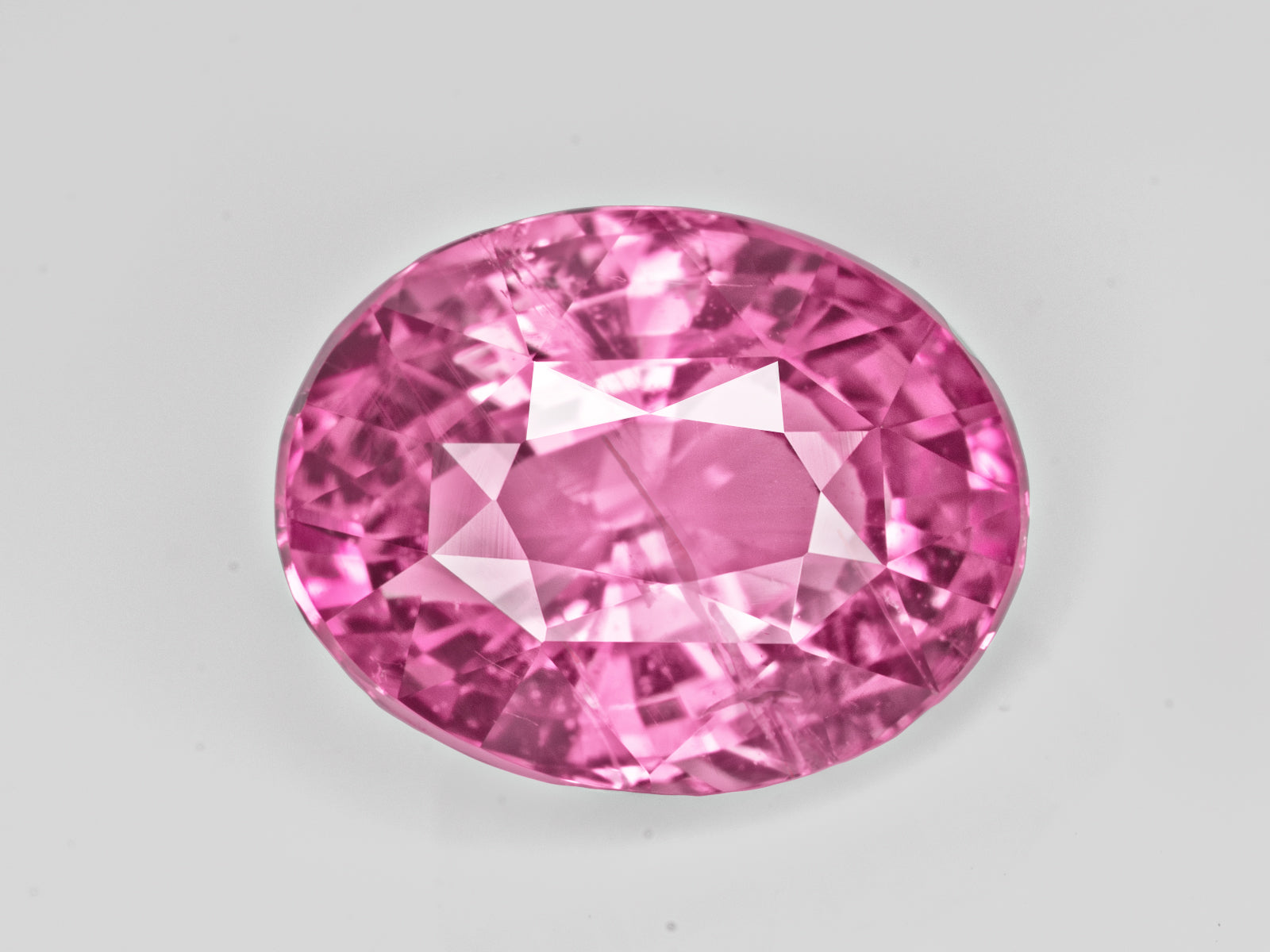 8803058-oval-fiery-intense-pink-with-slight-orangish-hue-aigs-madagascar-natural-padparadscha-3.05-ct