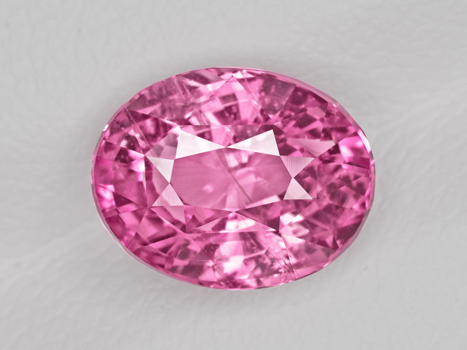 8803058-oval-fiery-intense-pink-with-slight-orangish-hue-aigs-madagascar-natural-padparadscha-3.05-ct