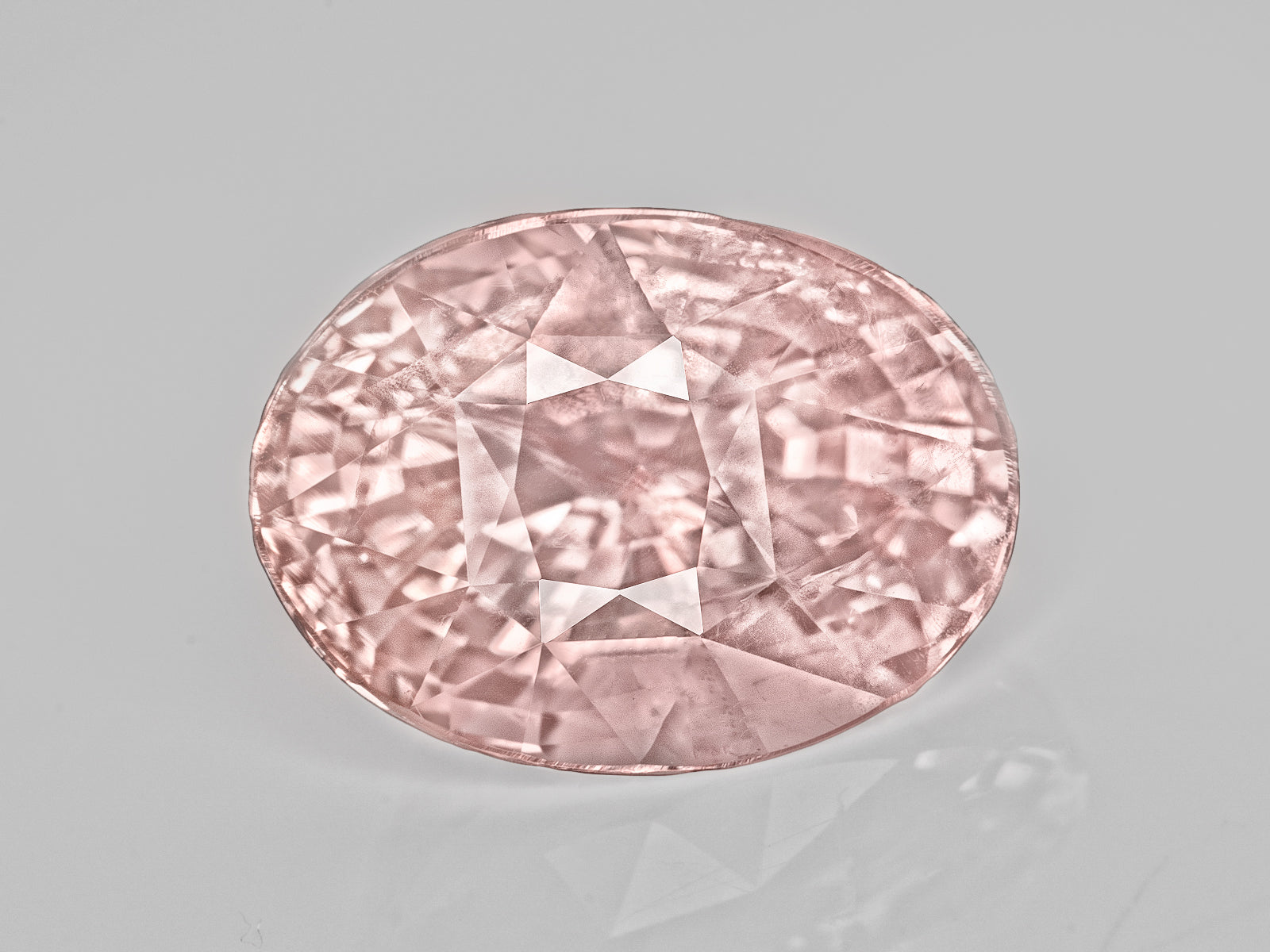 8803059-oval-lustrous-pastel-pinkish-orange-aigs-sri-lanka-natural-padparadscha-4.01-ct