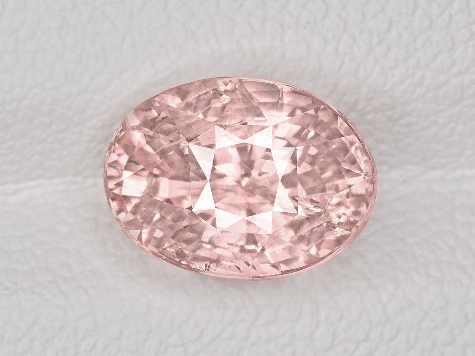8803059-oval-lustrous-pastel-pinkish-orange-aigs-sri-lanka-natural-padparadscha-4.01-ct