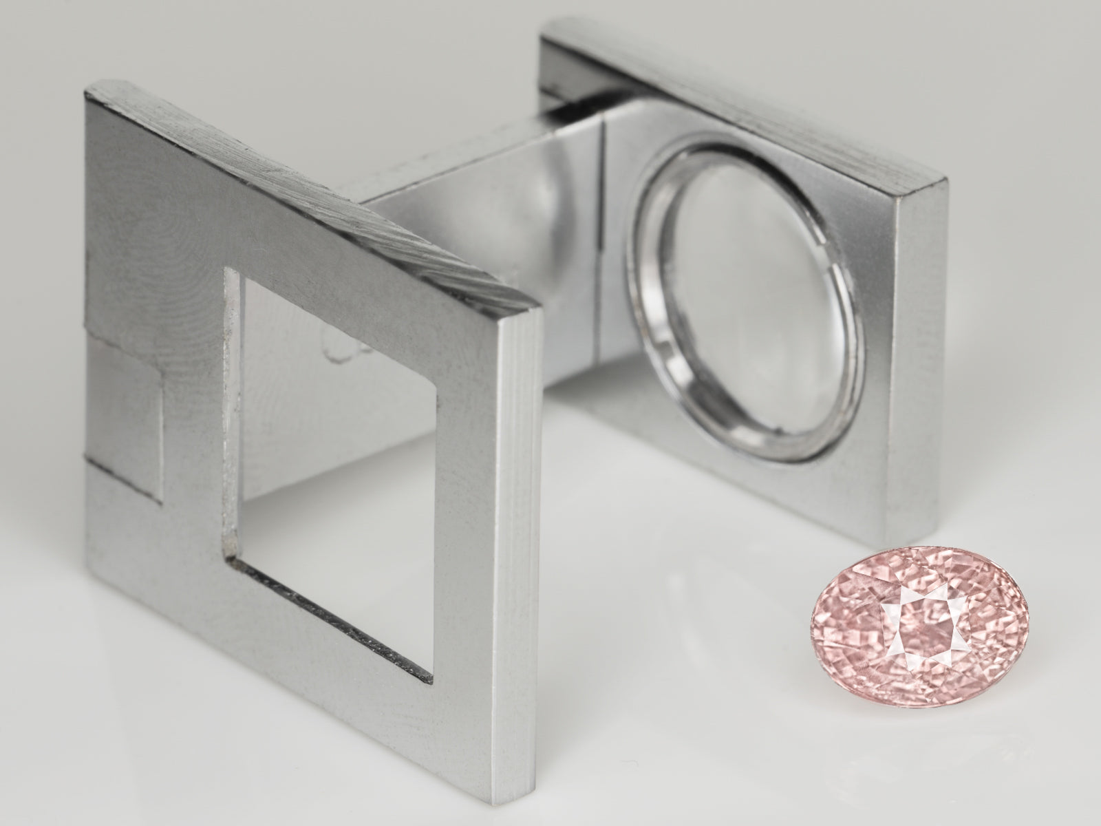 8803059-oval-lustrous-pastel-pinkish-orange-aigs-sri-lanka-natural-padparadscha-4.01-ct