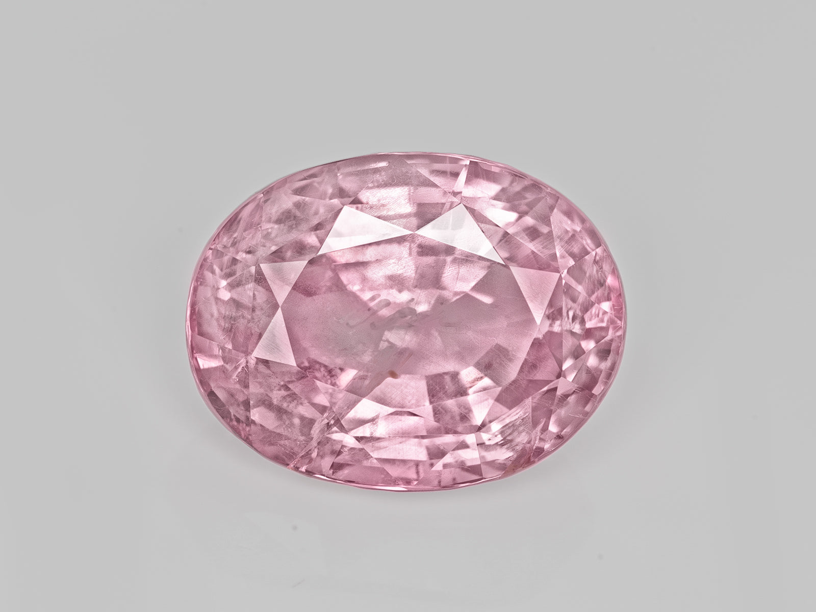 8803060-oval-pastel-pink-with-orangy-hue-aigs-madagascar-natural-padparadscha-3.18-ct