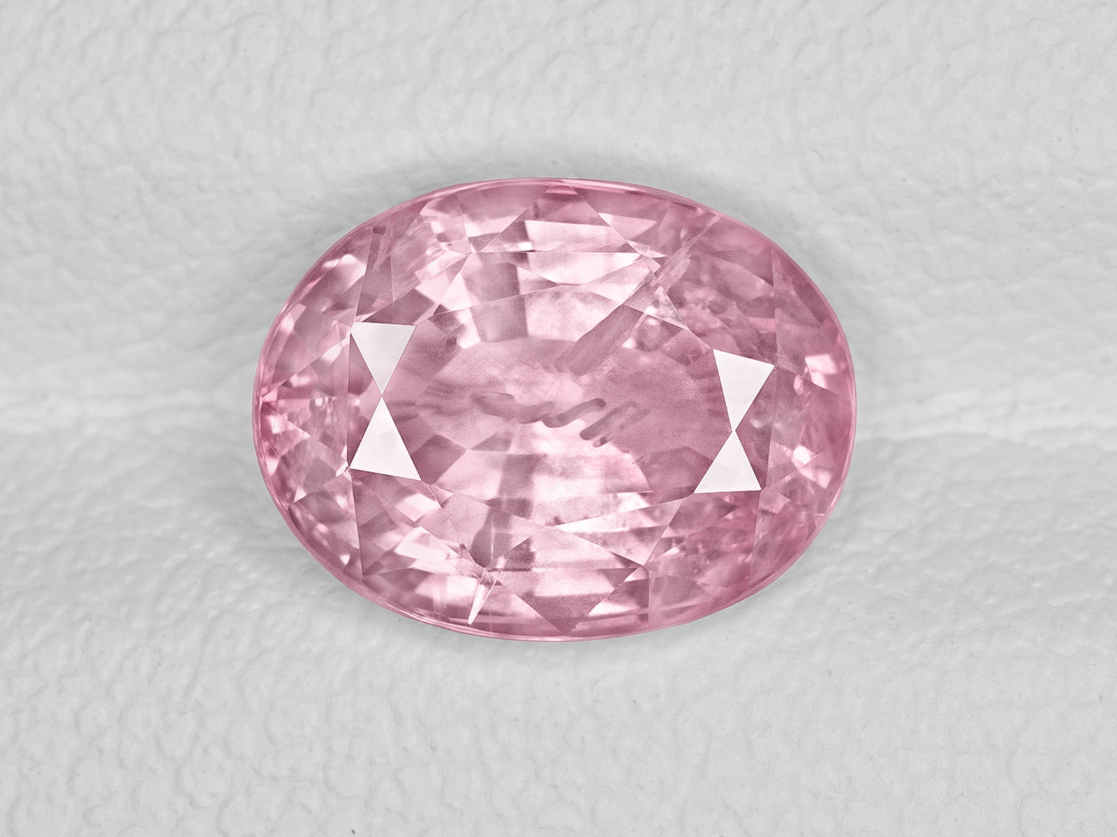 8803060-oval-pastel-pink-with-orangy-hue-aigs-madagascar-natural-padparadscha-3.18-ct