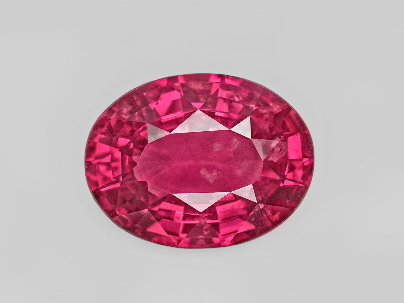 8803067-oval-fiery-neon-pinkish-red-gia-tanzania-natural-spinel-6.60-ct