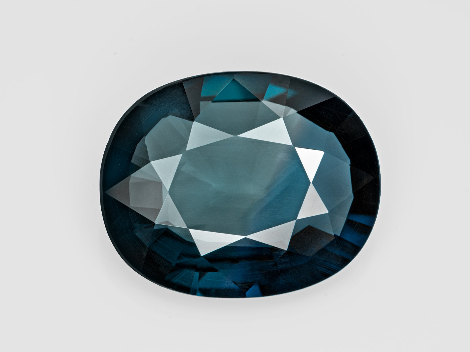 8803076-oval-dark-greenish-blue-color-zoning-grs-madagascar-natural-blue-sapphire-6.13-ct