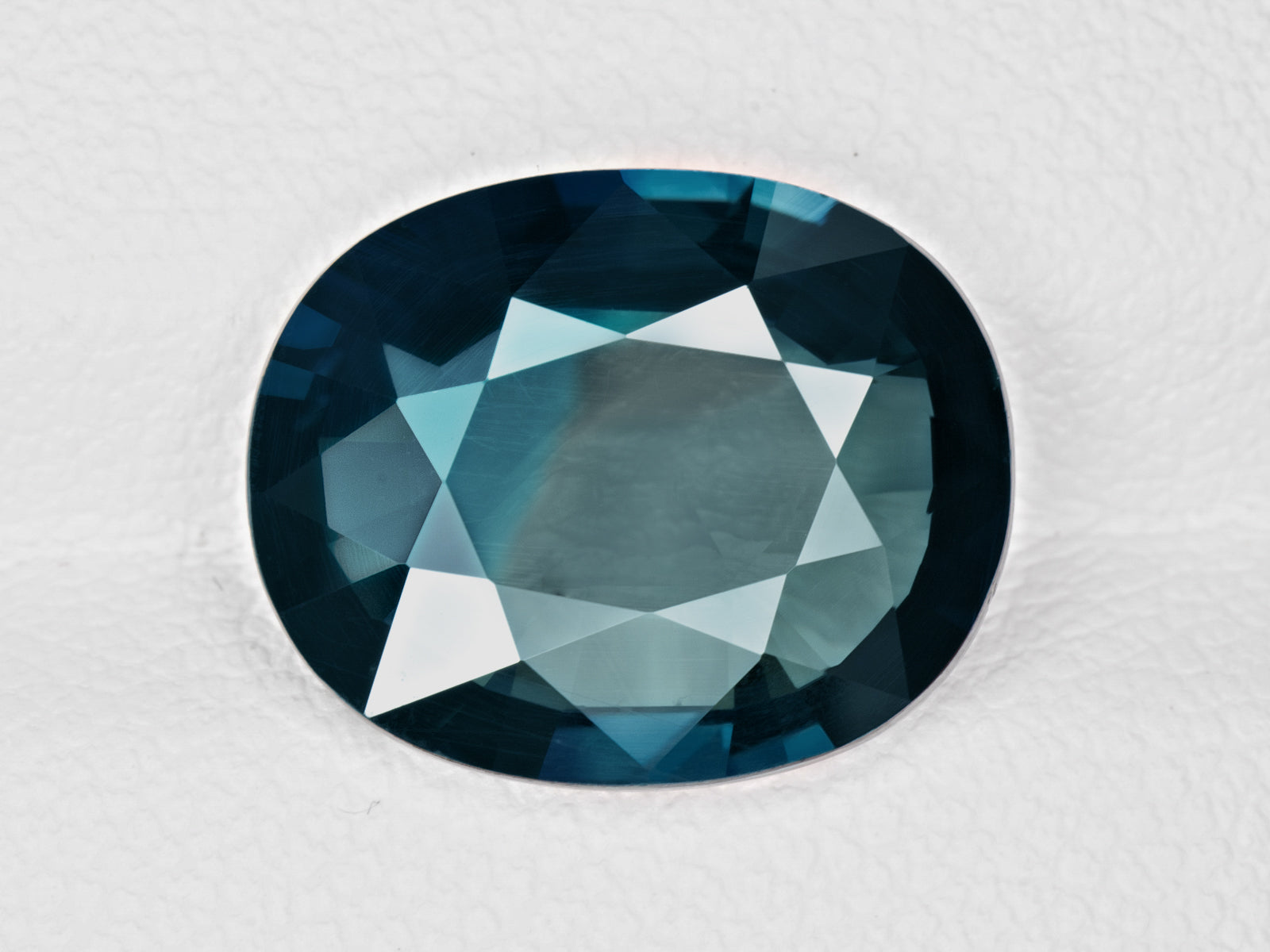 8803076-oval-dark-greenish-blue-color-zoning-grs-madagascar-natural-blue-sapphire-6.13-ct