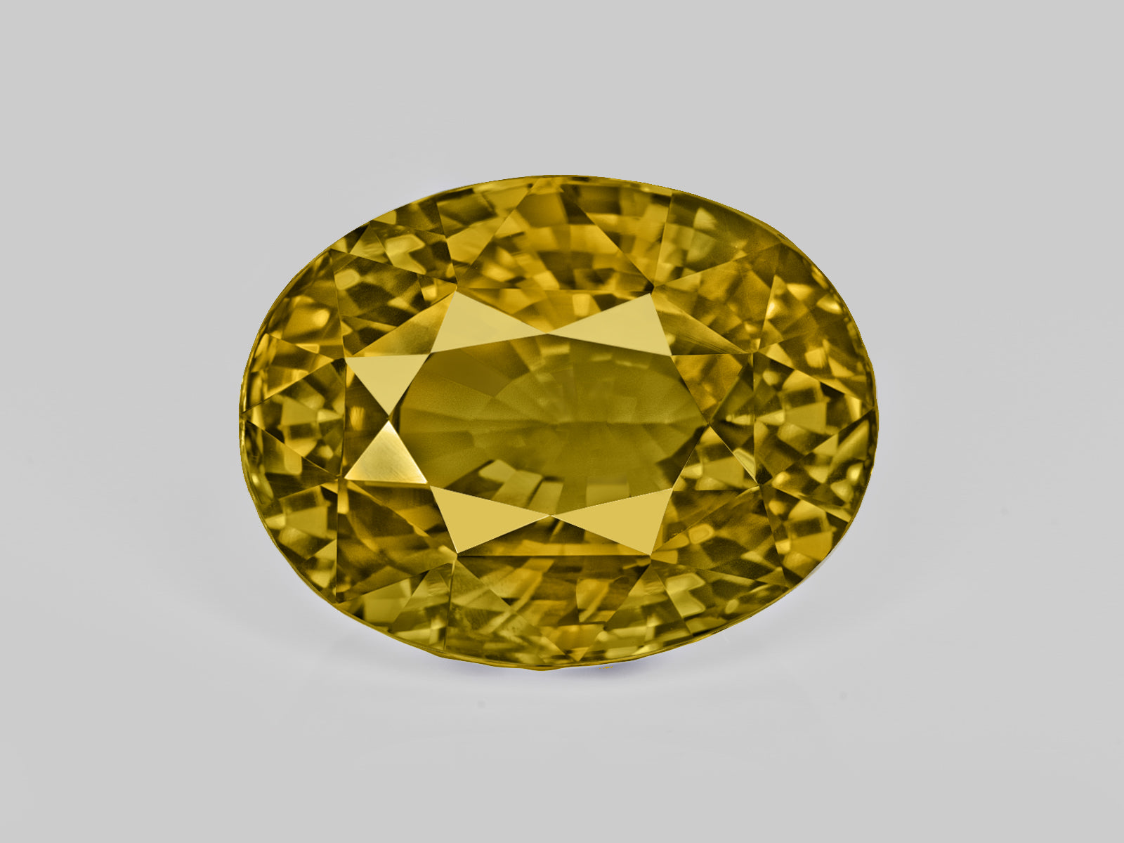 8803077-oval-fiery-vivid-yellowish-green-changing-to-brownish-yellow-gia-madagascar-natural-alexandrite-21.85-ct