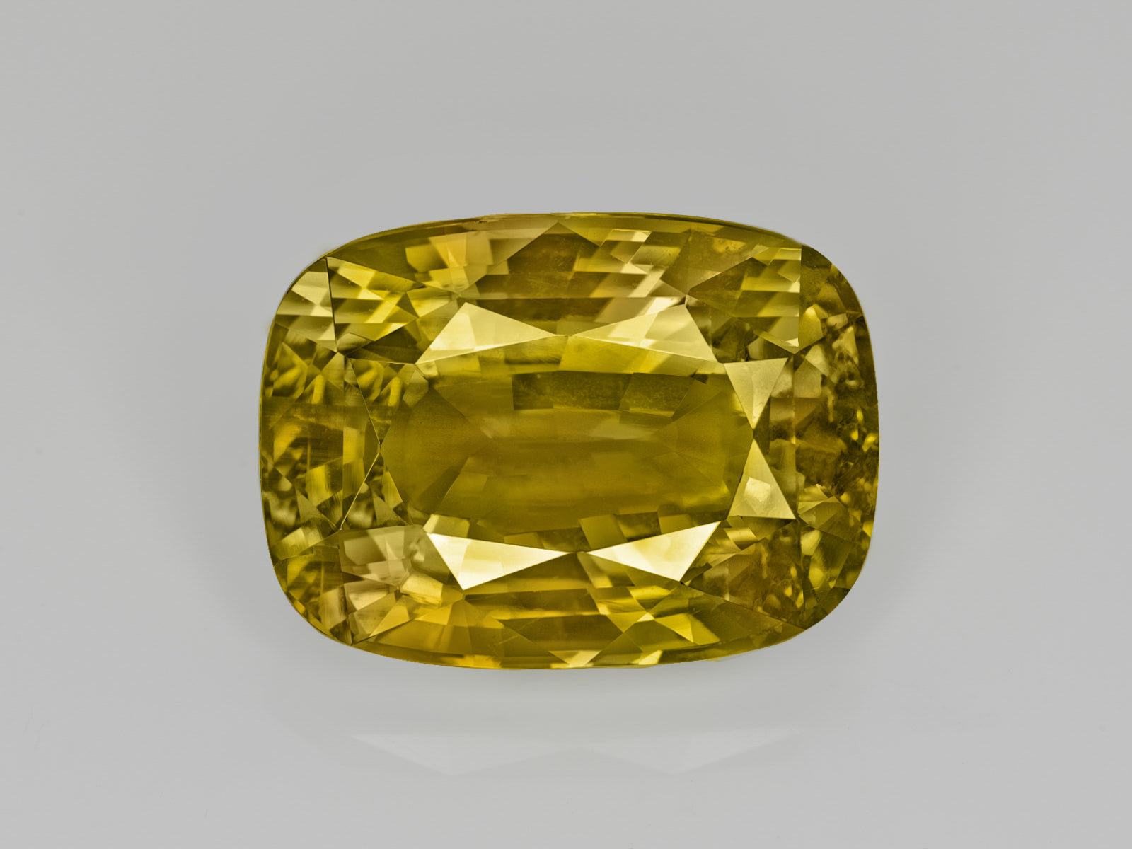 8803078-cushion-intense-yellowish-green-changing-to-brownish-yellow-gia-madagascar-natural-alexandrite-12.28-ct