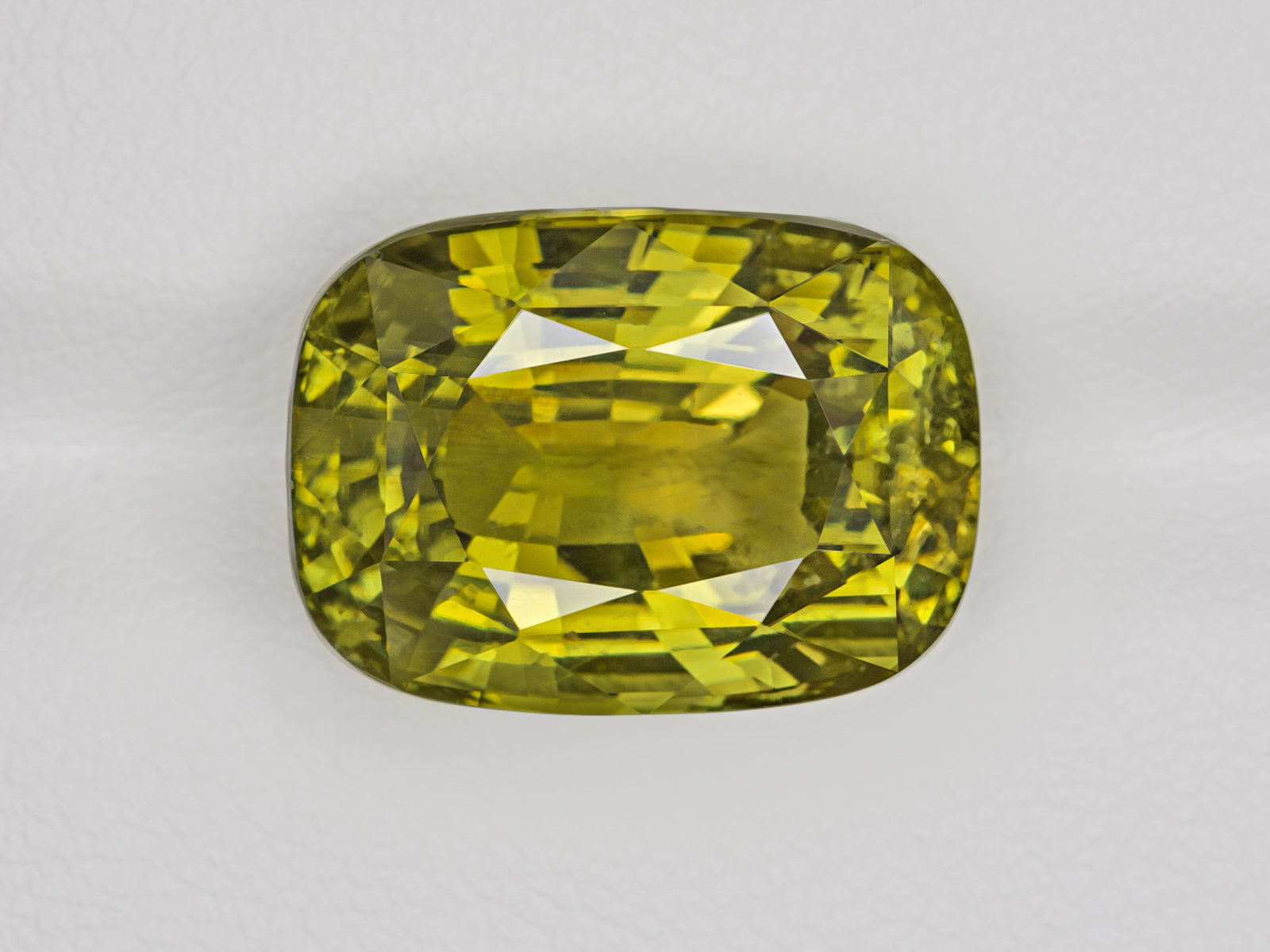 8803078-cushion-intense-yellowish-green-changing-to-brownish-yellow-gia-madagascar-natural-alexandrite-12.28-ct