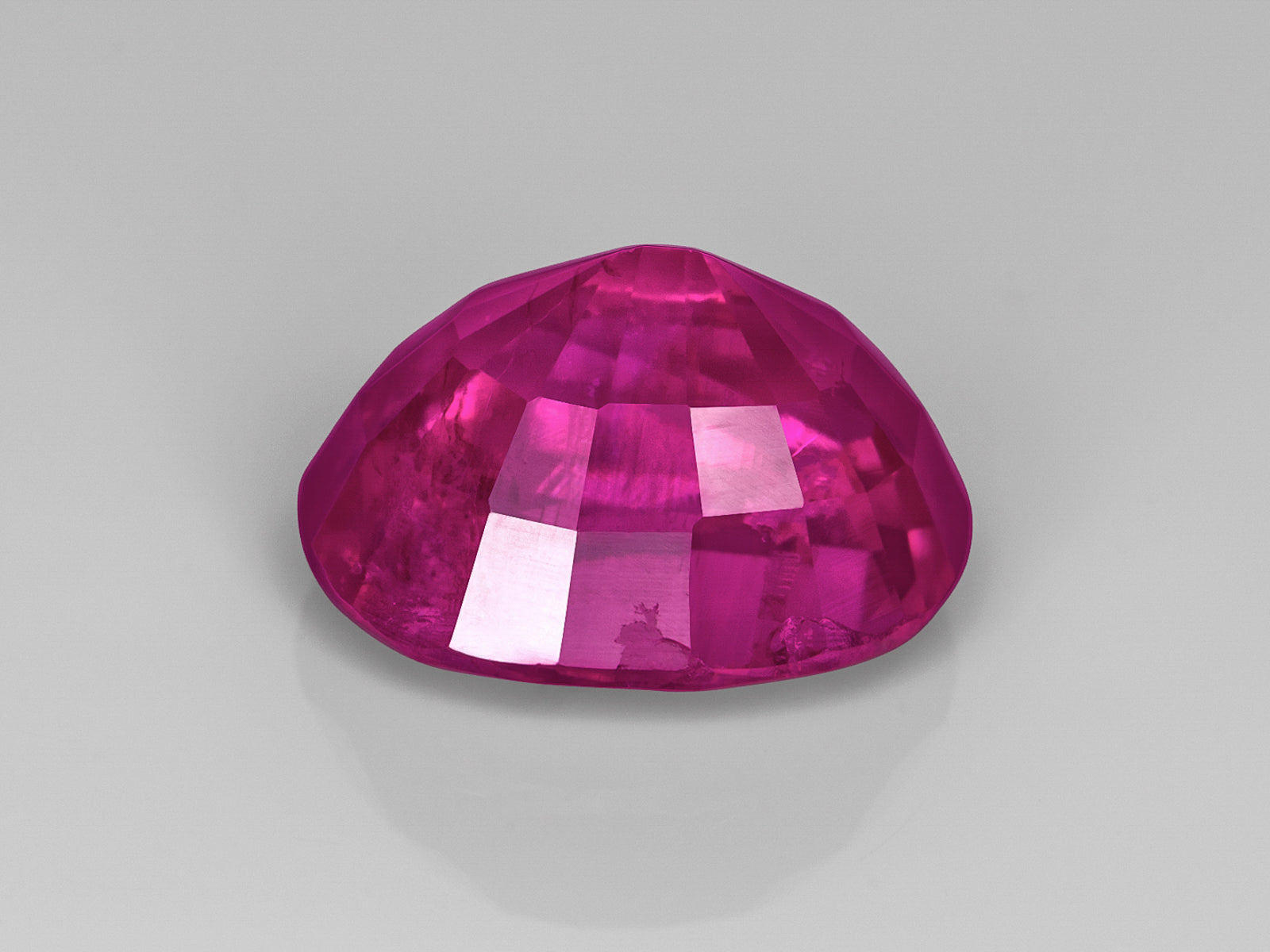 8803099-oval-rich-vivid-pinkish-red-lotus-afghanistan-natural-ruby-1.10-ct