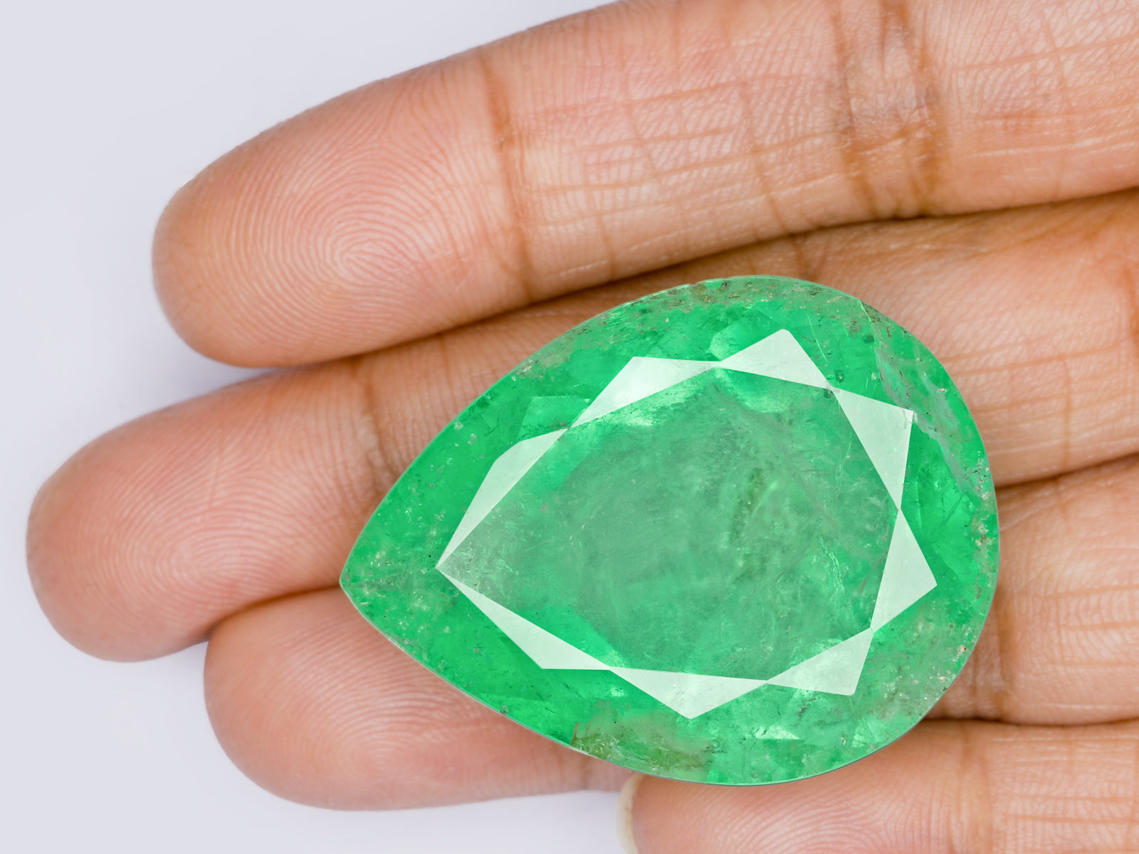 8803107-pear-lively-green-colombia-natural-emerald-75.16-ct