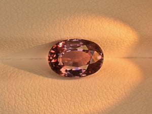 8800656-oval-lustrous-greyish-pink-changing-to-purplish-pink-igi-madagascar-natural-color-change-sapphire-2.35-ct
