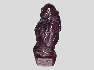 8801464-carved-dark-purple-red-gii-liberia-natural-ruby-149.80-ct