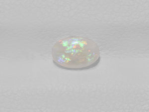 8801427-cabochon-very-light-yellow-with-multi-color-flashes-igi-australia-natural-white-opal-0.34-ct