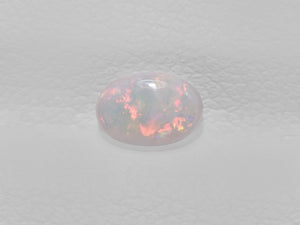 8801430-cabochon-greyish-yellow-with-multi-color-flashes-igi-australia-natural-white-opal-0.35-ct