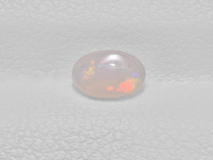 8801442-cabochon-very-light-greyish-yellow-with-multi-color-flashes-igi-australia-natural-white-opal-0.26-ct