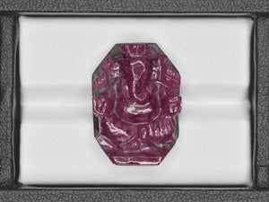 8801467-carved-bright-maroonish-red-with-green-matrix-gii-india-natural-ruby-35.08-ct