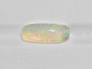 8801553-cabochon-very-light-yellow-with-multi-color-flashes-igi-ethiopia-natural-white-opal-2.70-ct