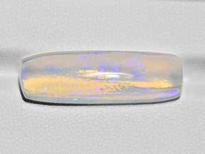 8801554-cabochon-very-light-yellow-with-green-&-blue-flashes-igi-ethiopia-natural-white-opal-10.99-ct